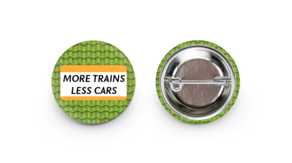 A round badge with a train ticket with the words "More trains, less cars" on a train moquette background